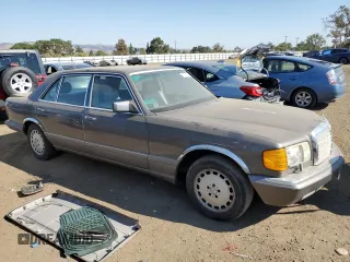 1986 Mercedes-Benz 420 with VIN WDBCA35D0GA254219, listed as a Copart auction lot 73718254 with 191,635 mi miles and Clean Title. Bid and sale history available at carsss.com. Image 4.