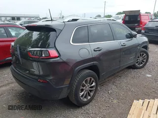 2020 Jeep Cherokee Latitude Plus with VIN 1C4PJMLBXLD580130, listed as a IAAI auction lot 42344240 with 82,814 mi miles and . Bid and sale history available at DreamBid. Image 4.