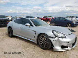 2014 Porsche Panamera с VIN WP0AA2A79EL009620, выставлен на аукционе Copart как лот 58654975 с пробегом 169 322 миль миль и Списание • Salvage title. История ставок и продаж доступна на DreamBid. Изображение 4.