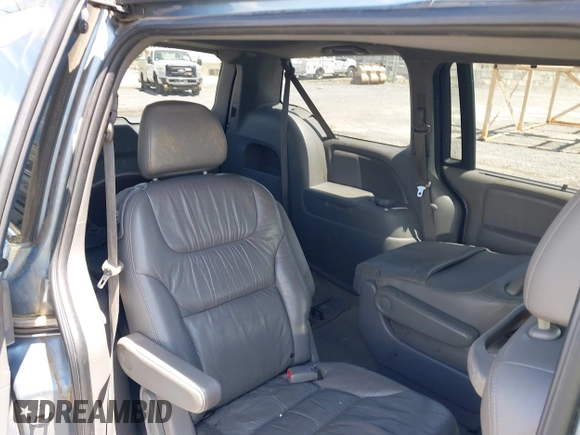 2010 Honda Odyssey Touring with VIN 5FNRL3H93AB058240, listed as a IAAI auction lot 42211192 with 223,859 mi miles and . Bid and sale history available at DreamBid. Image 8.