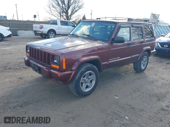 2000 Jeep Cherokee Classic with VIN 1J4FF58S7YL122676, listed as a IAAI auction lot 41710310 with 124,758 mi miles. Bid and sale history available at carsss.com. Image 2.