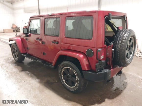 2012 Jeep Wrangler Unlimited Sahara with VIN 1C4BJWEG0CL256852, listed as a IAAI auction lot 41765640 with 171,408 mi miles. Bid and sale history available at carsss.com. Image 3.