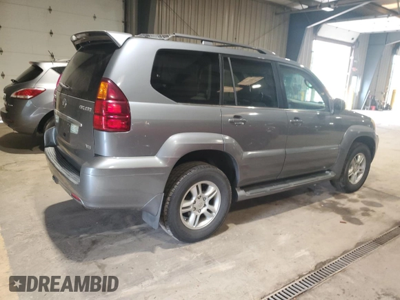 2004 Lexus GX 470 with VIN JTJBT20X440035197, listed as a Copart auction lot 57522615 with 259,528 mi miles and Clean Title. Bid and sale history available at DreamBid. Image 3.