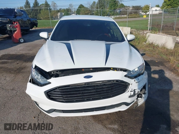2020 Ford Fusion SE z VIN 3FA6P0T93LR247572, wystawiony jako IAAI lot #40481880 z przebiegiem 59 141 mil mil oraz . Historia ofert i sprzedaży dostępna na DreamBid. Obrazek 12.