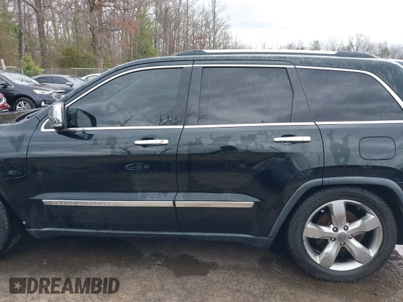 2013 Jeep Grand Cherokee Overland with VIN 1C4RJFCG8DC614542, listed as a IAAI auction lot 41733846 with 44,131 mi miles. Bid and sale history available at carsss.com. Image 14.