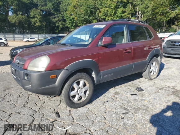 2005 Hyundai Tucson GLS with VIN KM8JN12D15U141358, listed as a Copart auction lot 73715334 with 173,503 mi miles and Salvage Title. Bid and sale history available at carsss.com. Image 1.