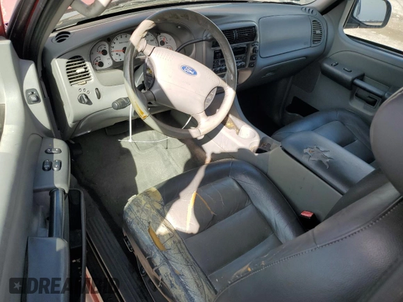 2003 Ford Explorer Sport XLS z VIN 1FMYU60EX3UA37605, wystawiony jako Copart lot #47489395 z przebiegiem 120 957 mil mil oraz Tytuł czysty. Historia ofert i sprzedaży dostępna na DreamBid. Obrazek 8.