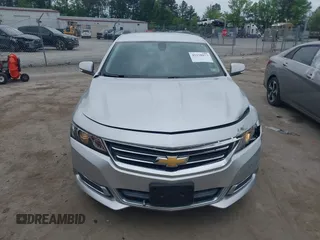 2014 Chevrolet Impala LT with VIN 2G1125S3XE9114130, listed as a IAAI auction lot 42128077 with 209,391 mi miles and . Bid and sale history available at DreamBid. Image 12.