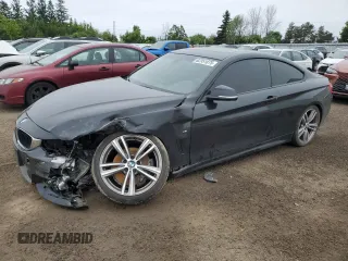 2014 BMW 4 Series 435i xDrive with VIN WBA3R5C5XEK188672, listed as a Copart auction lot 62351875 with 58,889 mi miles and Salvage title. Bid and sale history available at DreamBid. Image 1.