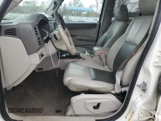 2010 Jeep Commander Limited z VIN 1J4RG5GT4AC153264, wystawiony jako Copart lot #77358474 z przebiegiem 170 634 mil mil oraz Szkoda całkowita • Salvage title. Historia ofert i sprzedaży dostępna na DreamBid. Obrazek 7.