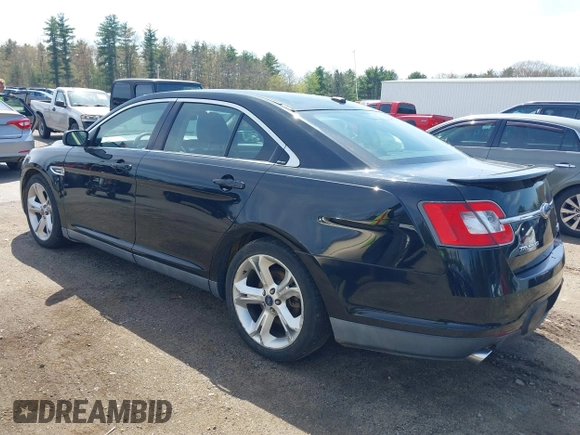 2011 Ford Taurus SHO z VIN 1FAHP2KT7BG188095, wystawiony jako IAAI lot #42180454 z przebiegiem 161 656 mil mil oraz . Historia ofert i sprzedaży dostępna na DreamBid. Obrazek 3.