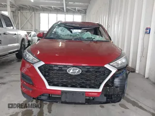 2021 Hyundai Tucson Value with VIN KM8J33A44MU363524, listed as a IAAI auction lot 41854508 with 59,821 mi miles. Bid and sale history available at carsss.com. Image 12.
