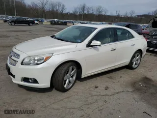 2013 Chevrolet Malibu LTZ with VIN 1G11J5SX6DF304714, listed as a Copart auction lot 52858435 with 118,013 mi miles and Salvage Title. Bid and sale history available at carsss.com. Image 1.