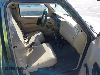 2002 Mazda B-Series 2WD Truck SX with VIN 4F4YR12D32TM21251, listed as a IAAI auction lot 41273974 with 155,165 mi miles. Bid and sale history available at carsss.com. Image 5.