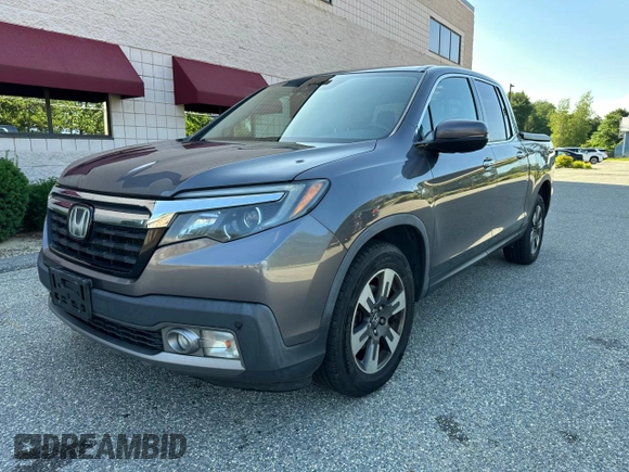 2019 Honda Ridgeline RTL-E with VIN 5FPYK3F71KB009532, listed as a Copart auction lot 65827935 with 217,177 mi miles and Clean title. Bid and sale history available at DreamBid. Image 2.