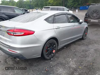 2020 Ford Fusion SE with VIN 3FA6P0HD5LR150418, listed as a IAAI auction lot 42347924 with 87,817 mi miles and . Bid and sale history available at DreamBid. Image 4.