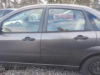 2006 Ford Focus S z VIN 1FAFP34NX6W179320, wystawiony jako IAAI lot #41937794 z przebiegiem 211 961 mil mil oraz . Historia ofert i sprzedaży dostępna na DreamBid. Obrazek 13.