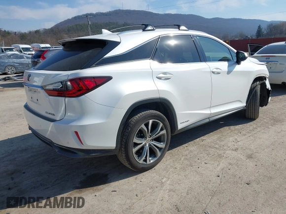 2016 Lexus RX 450h with VIN 2T2BGMCAXGC004844, listed as a IAAI auction lot 41791066 with 100,604 mi miles and . Bid and sale history available at DreamBid. Image 4.