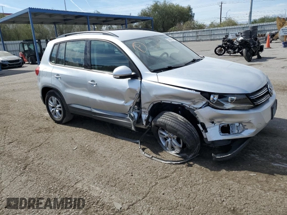 2017 Volkswagen Tiguan S with VIN WVGAV7AX1HK026998, listed as a Copart auction lot 74959504 with 93,696 mi miles and Salvage Title. Bid and sale history available at DreamBid. Image 4.