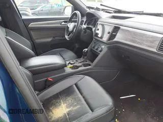 2021 Volkswagen Atlas SE with VIN 1V2LC2CA2MC228525, listed as a IAAI auction lot 42127917 with 74,707 mi miles and . Bid and sale history available at DreamBid. Image 5.