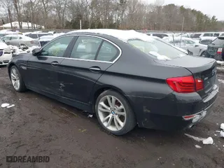 2015 BMW 5 Series 535i xDrive with VIN WBA5B3C58FD540350, listed as a IAAI auction lot 41551064 with 999,999 mi miles. Bid and sale history available at carsss.com. Image 3.