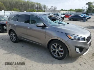 2016 Kia Sorento SX with VIN 5XYPKDA50GG102302, listed as a Copart auction lot 51638385 with 101,063 mi miles and Salvage Title. Bid and sale history available at carsss.com. Image 4.