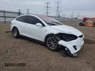 2016 Tesla Model X 70D z VIN 5YJXCBE25GF016928, wystawiony jako Copart lot #83615564 z przebiegiem Nie podano mil oraz Szkoda całkowita • Salvage title. Historia ofert i sprzedaży dostępna na DreamBid. Obrazek 4.