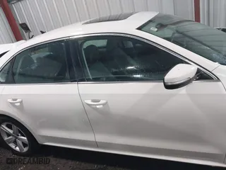 2013 Volkswagen Passat SE w/Sunroof with VIN 1VWBH7A35DC111003, listed as a IAAI auction lot 41991990 with 142,103 mi miles. Bid and sale history available at carsss.com. Image 13.