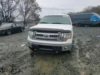 2014 Ford F-150 XL with VIN 1FTFW1ET8EFB80320, listed as a Copart auction lot 84093794 with 122,000 mi miles and Salvage Title. Bid and sale history available at carsss.com. Image 11.