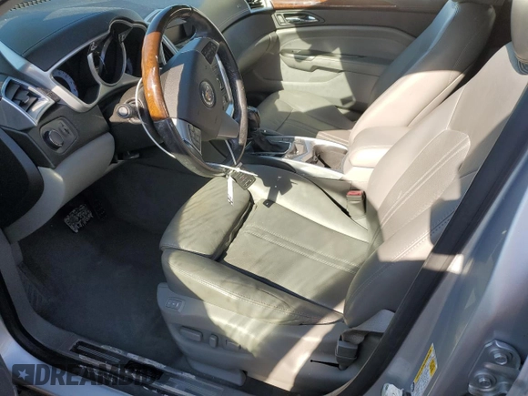 2012 Cadillac SRX Luxury Collection with VIN 3GYFNAE33CS625827, listed as a Copart auction lot 49527084 with 0 mi miles and Salvage Title. Bid and sale history available at carsss.com. Image 7.