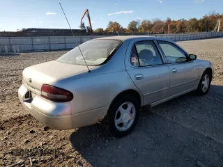 1997 Nissan Altima XE z VIN 1N4BU31DXVC166151, wystawiony jako Copart lot #76300214 z przebiegiem 202 356 mil mil oraz Czysty tytuł • Clean title. Historia ofert i sprzedaży dostępna na DreamBid. Obrazek 3.
