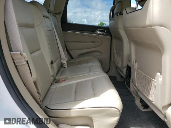 2018 Jeep Grand Cherokee High Altitude z VIN 1C4RJFCT9JC444510, wystawiony jako Copart lot #58078285 z przebiegiem 98 226 mil mil oraz Szkoda całkowita • Salvage title. Historia ofert i sprzedaży dostępna na DreamBid. Obrazek 11.