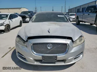 2012 Jaguar XJ with VIN SAJWA1CB0CLV23002, listed as a Copart auction lot 52804915 with 149,331 mi miles and Salvage Title. Bid and sale history available at carsss.com. Image 5.