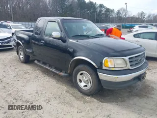 2000 Ford F-150 XL with VIN 1FTZX0725YKA09559, listed as a IAAI auction lot 41810954 with Not provided miles and . Bid and sale history available at DreamBid. Image 1.