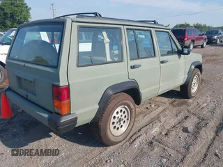 1992 Jeep Cherokee with VIN 1J4FT88S2NL251950, listed as a IAAI auction lot 42662079 with 1,689,263 mi miles and . Bid and sale history available at DreamBid. Image 4.