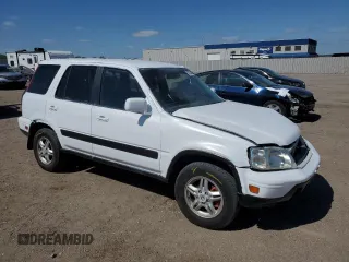 2000 Honda CR-V SE z VIN JHLRD1876YS020548, wystawiony jako Copart lot #57823525 z przebiegiem 211 164 mil mil oraz Szkoda całkowita • Salvage title. Historia ofert i sprzedaży dostępna na DreamBid. Obrazek 4.