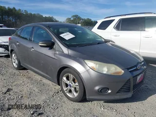 2014 Ford Focus SE with VIN 1FADP3F2XEL315908, listed as a IAAI auction lot 41843004 with 114,203 mi miles. Bid and sale history available at carsss.com. Image 1.