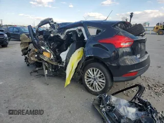 2017 Ford Focus Titanium z VIN 1FADP3N23HL291408, wystawiony jako Copart lot #83876124 z przebiegiem Nie podano mil oraz Szkoda całkowita • Salvage title. Historia ofert i sprzedaży dostępna na DreamBid. Obrazek 2.