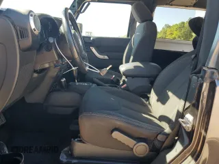 2017 Jeep Wrangler Sahara z VIN 1C4AJWBG1HL669600, wystawiony jako Copart lot #52856865 z przebiegiem 85 311 mil mil oraz Szkoda całkowita • Salvage title. Historia ofert i sprzedaży dostępna na DreamBid. Obrazek 7.