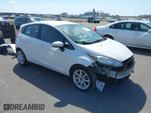 2016 Ford Fiesta SE with VIN 3FADP4EJ6GM170303, listed as a IAAI auction lot 42045585 with 121,162 mi miles. Bid and sale history available at carsss.com. Image 1.
