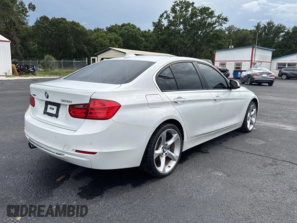 2015 BMW 3 Series 328i xDrive with VIN WBA3B5C59FP654679, listed as a Copart auction lot 59805525 with 120,885 mi miles and Clean title. Bid and sale history available at DreamBid. Image 4.