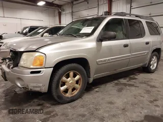 2005 GMC Envoy SLE with VIN 1GKET16S656102522, listed as a IAAI auction lot 41729310 with 233,049 mi miles. Bid and sale history available at carsss.com. Image 2.