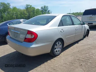 2004 Toyota Camry LE with VIN 4T1BE32K24U817748, listed as a IAAI auction lot 42155150 with 158,437 mi miles and . Bid and sale history available at DreamBid. Image 4.