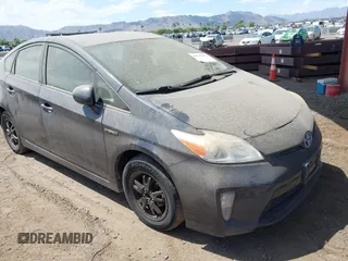 2012 Toyota Prius One z VIN JTDKN3DU7C1524401, wystawiony jako IAAI lot #42765417 z przebiegiem 233 218 mil mil oraz . Historia ofert i sprzedaży dostępna na DreamBid. Obrazek 1.