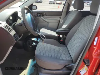 2007 Ford Focus S z VIN 1FAFP34NX7W360015, wystawiony jako Copart lot #57499655 z przebiegiem 237 516 mil mil oraz Szkoda całkowita • Salvage title. Historia ofert i sprzedaży dostępna na DreamBid. Obrazek 7.