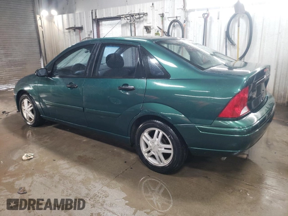2000 Ford Focus SE with VIN 1FAFP3432YW312878, listed as a Copart auction lot 45812005 with 164,560 mi miles and Salvage Title. Bid and sale history available at carsss.com. Image 2.