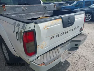 2001 Nissan Frontier SE z VIN 1N6ED27T61C324671, wystawiony jako IAAI lot #42403537 z przebiegiem 190 638 mil mil oraz . Historia ofert i sprzedaży dostępna na DreamBid. Obrazek 19.