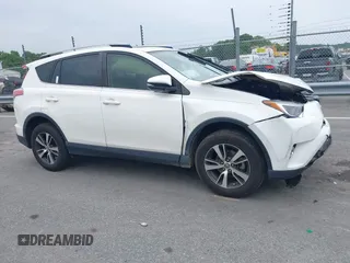 2018 Toyota RAV4 XLE with VIN JTMWFREV2JJ739366, listed as a IAAI auction lot 42270427 with 112,558 mi miles and . Bid and sale history available at DreamBid. Image 1.