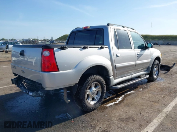 2003 Ford Explorer Sport Trac XLS z VIN 1FMZU77E13UC70465, wystawiony jako IAAI lot #42079056 z przebiegiem 123 046 mil mil oraz . Historia ofert i sprzedaży dostępna na DreamBid. Obrazek 4.