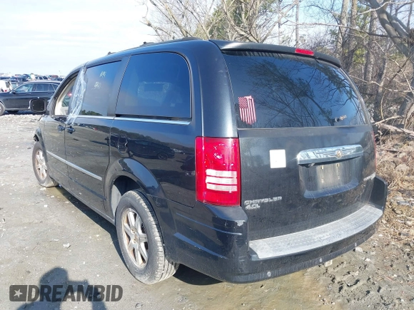 2009 Chrysler Town & Country Touring with VIN 2A8HR54X39R629941, listed as a IAAI auction lot 41525899 with 151,803 mi miles and . Bid and sale history available at DreamBid. Image 3.